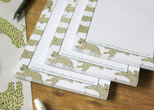 Load image into Gallery viewer, Harriet Billingham illustration soft coated wheaten terrier A5 notepad. Showing 3 notepads close up.