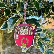 Load image into Gallery viewer, Decorative Christmas ornament of two soft coated wheaten terriers in a gondola.