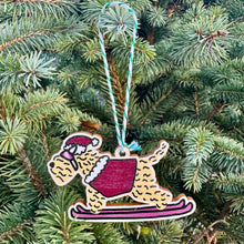Load image into Gallery viewer, Decorative Christmas ornament of a dog skiing fast hanging on a Christmas tree.