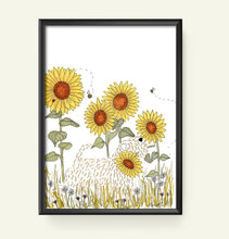 Load image into Gallery viewer, A framed art print featuring a whimsical illustration of yellow sunflowers, a soft coated wheaten terrier dog0, and small bees on a white background, enclosed in a thin black frame against a light beige wall.