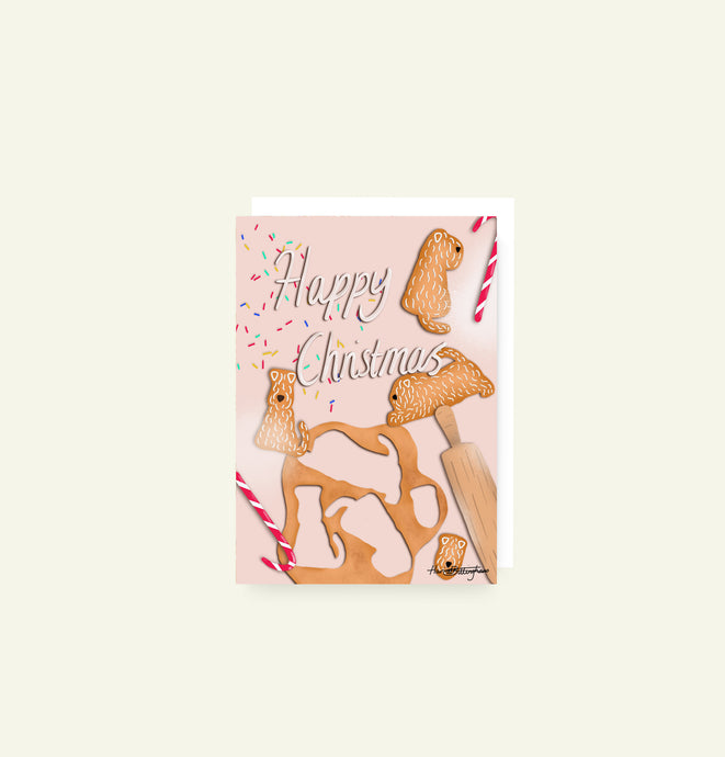 Soft coated wheaten terrier christmas card in a gingerbread theme with icing, rolling pin and candy canes designed and drawn by Harriet Billingham