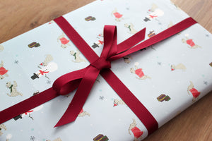 close up of wrapping paper with wheaten terriers on it