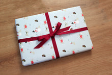 Load image into Gallery viewer, wheaten wrapping paper example of a present being wrapped
