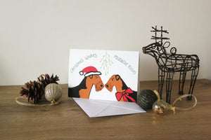 Airedale Christmas wishes and mistletoe wishes card. 