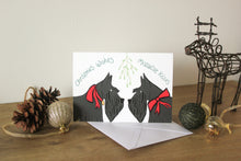 Load image into Gallery viewer, scottish terriers under mistletoe wearing red ribbons
