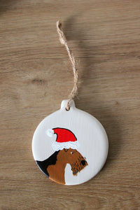 Airedale with a Santa hat Christmas Decoration