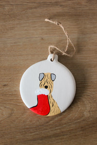 Soft coated wheaten terrier chrismtas decoration with a stocking