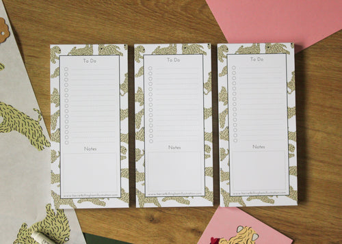 A photograph of three To Do list notepads next to each other, if you buy three you save money off.