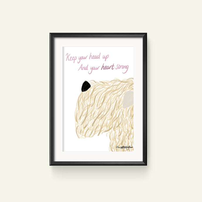 A framed print featuring a digital hand-drawn illustration of a Soft Coated Wheaten Terriers' head with the phrase 'Keep Your Head Up And Your Heart Strong'.