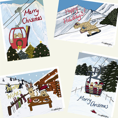 Collection of Christmas-themed cards with skiing winter scenes and festive elements.