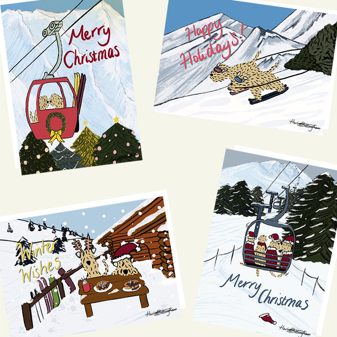 Collection of Christmas-themed cards with skiing winter scenes and festive elements.