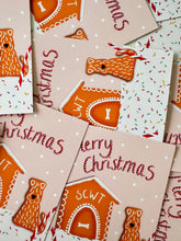 Load image into Gallery viewer, A laydown of loads of Merry Christmas Soft Coated Wheaten Terrier Christmas cards in a fun gingerbread theme designed by Harriet Billingham
