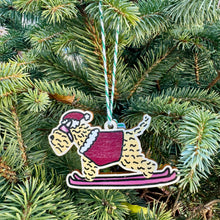 Load image into Gallery viewer, Decorative Christmas ornament of a dog skiing hanging on a tree.
