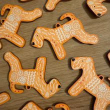Load image into Gallery viewer, close up of wheaten gingerbread decorations
