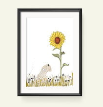 Load image into Gallery viewer, A framed art print featuring a whimsical illustration of a soft coated wheaten terrier in a field beneath a large sunflower, displayed on a light cream background.

